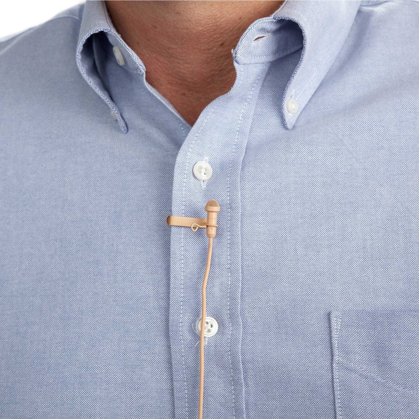 Acacia Audio tan lavalier microphone with clip and windscreen, designed for discreet voice recording shown on shirt