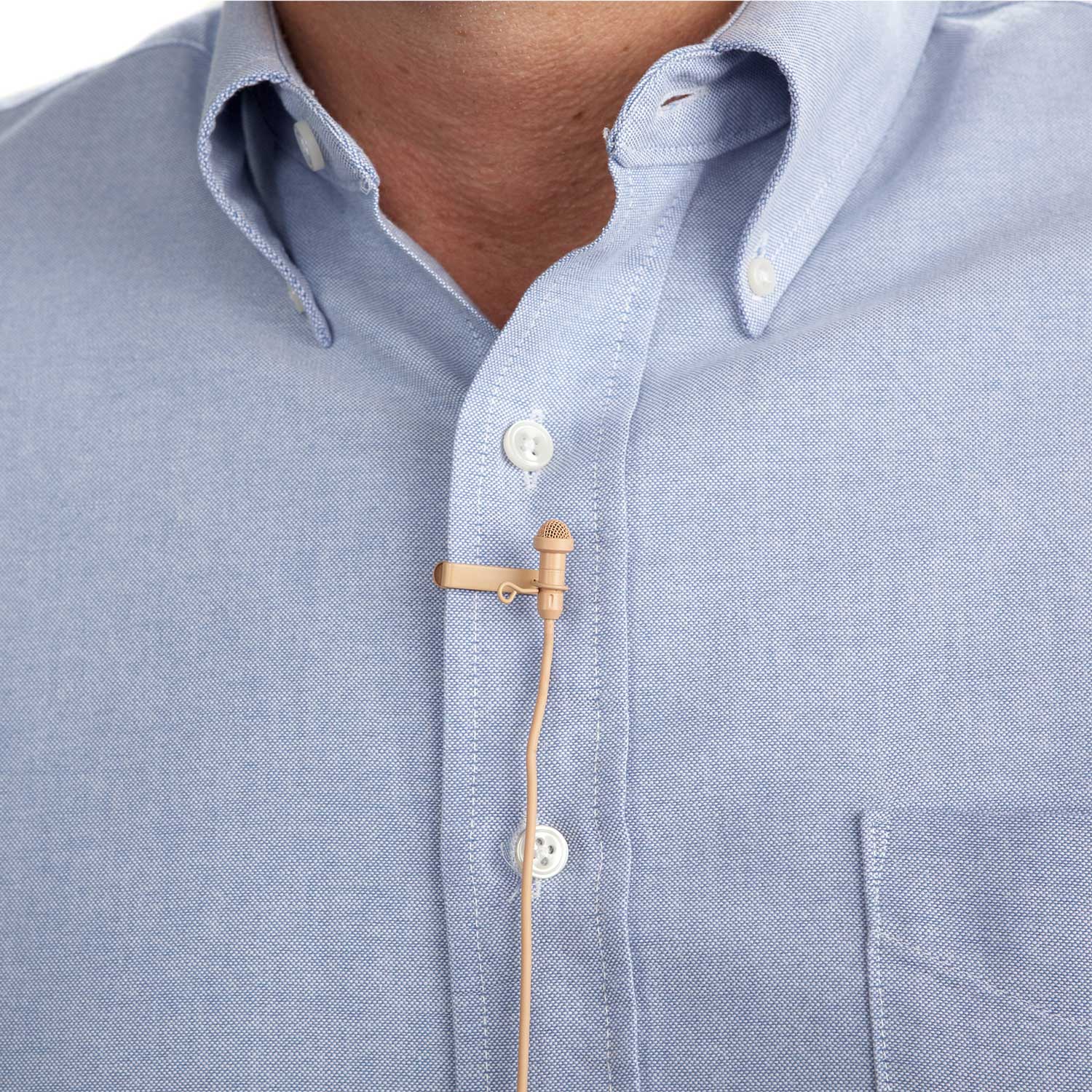 Acacia Audio tan lavalier microphone with clip and windscreen, designed for discreet voice recording shown on shirt